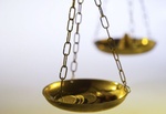 Close-up of the scales of justice