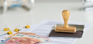 Steuerermäßigung bei Belastung mit Erbschaftsteuer